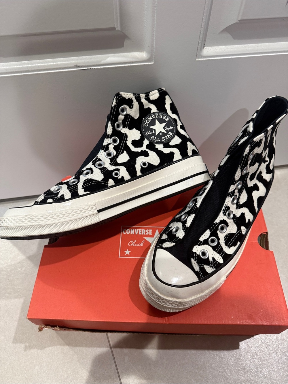 Converse Women's High Top Sneakers - Black & White Cow Print
